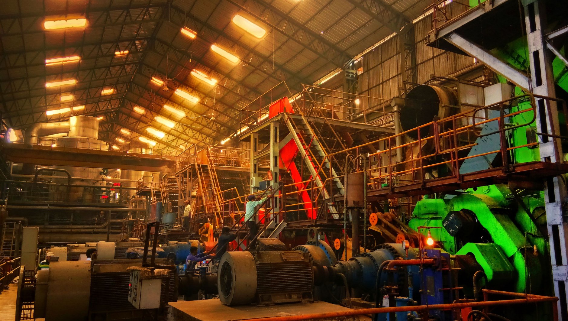 Indian paper converting factory production floor where conversion cost per bag is set