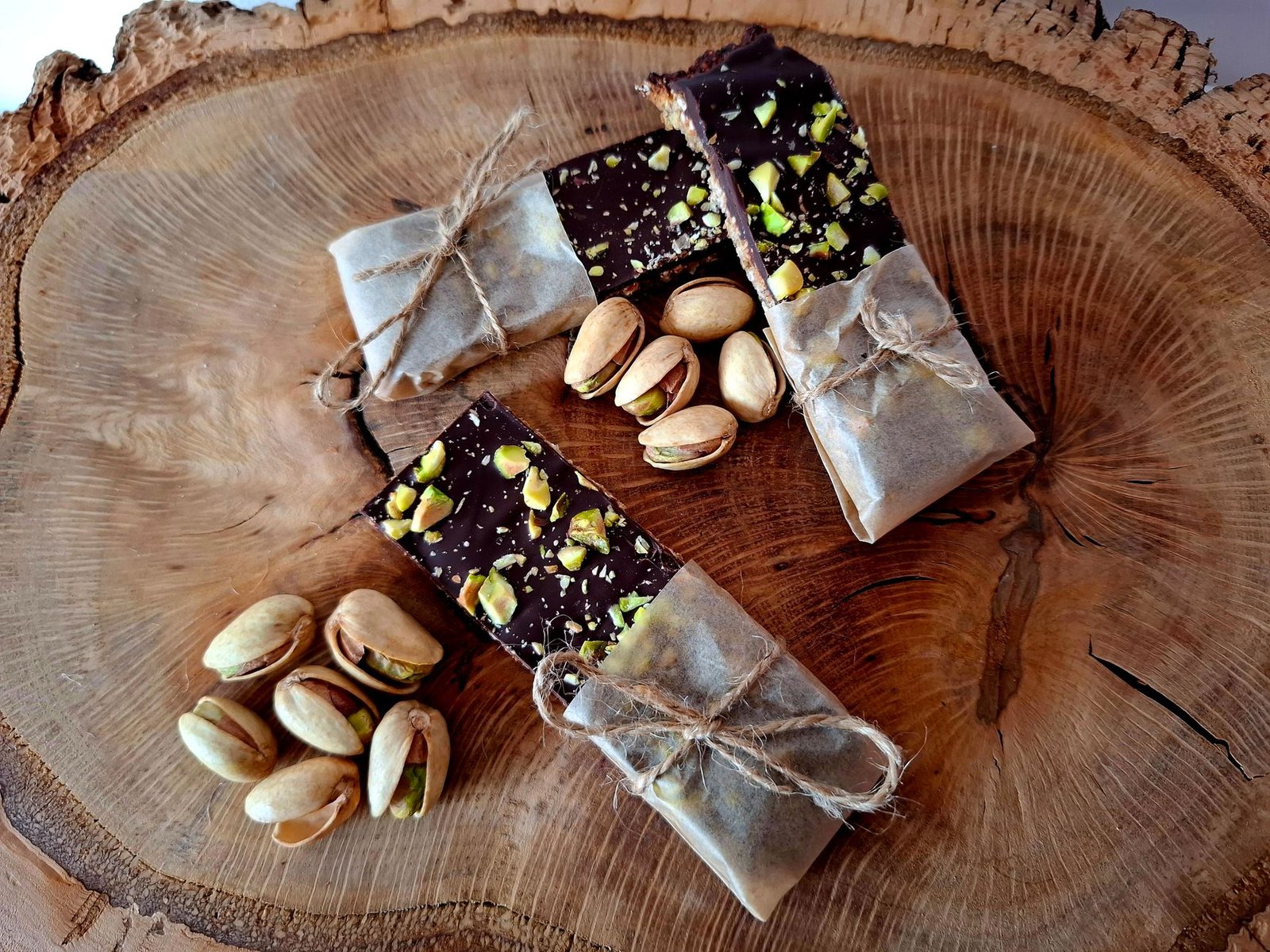 Chocolate bars wrapped in paper, showing where a paper-based chocolate wrapper fits